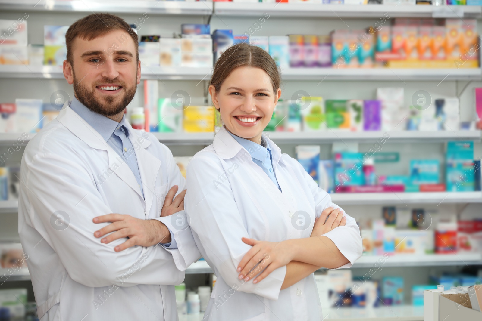 Image of Portrait of professional pharmacists in modern drugstore