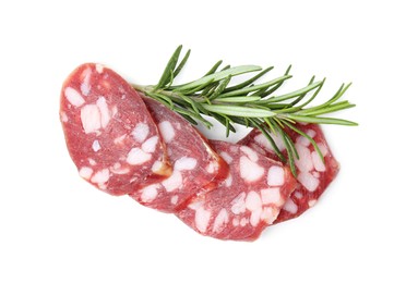 Photo of Delicious cut smoked sausage with rosemary isolated on white, top view