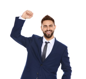 Photo of Happy young businessman celebrating victory on white background