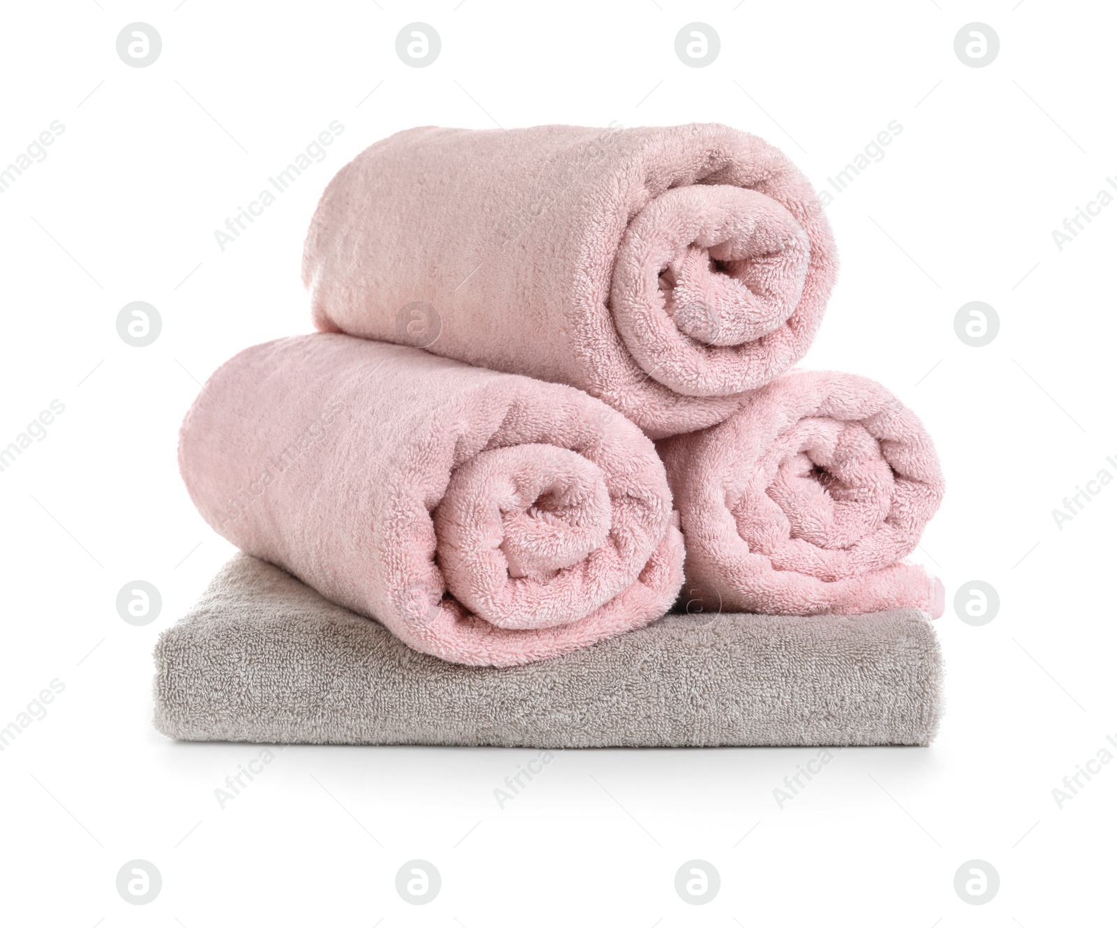 Photo of Fresh soft terry towels on white background