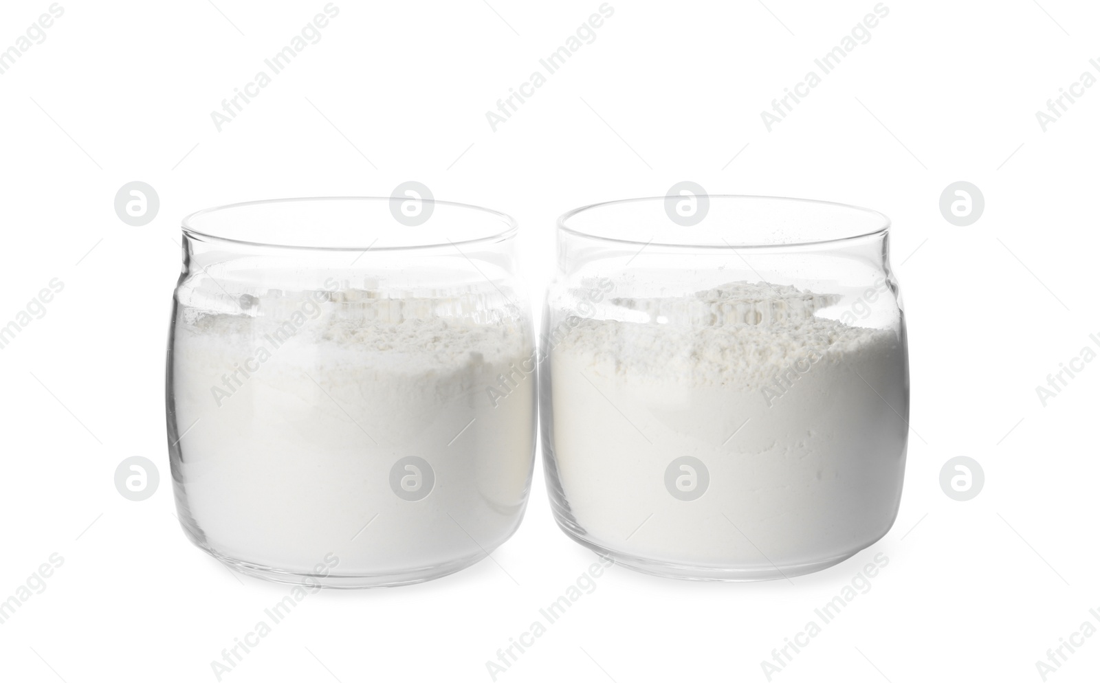 Photo of Organic flour in glass jars isolated on white