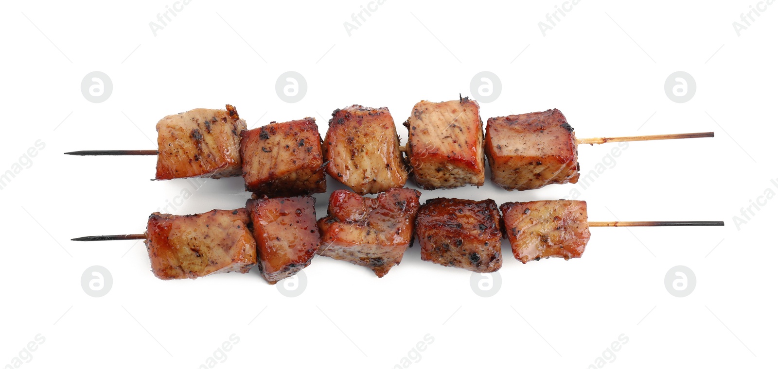 Photo of Skewers with delicious shish kebabs isolated on white, top view