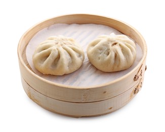 Delicious bao buns (baozi) in bamboo steamer isolated on white