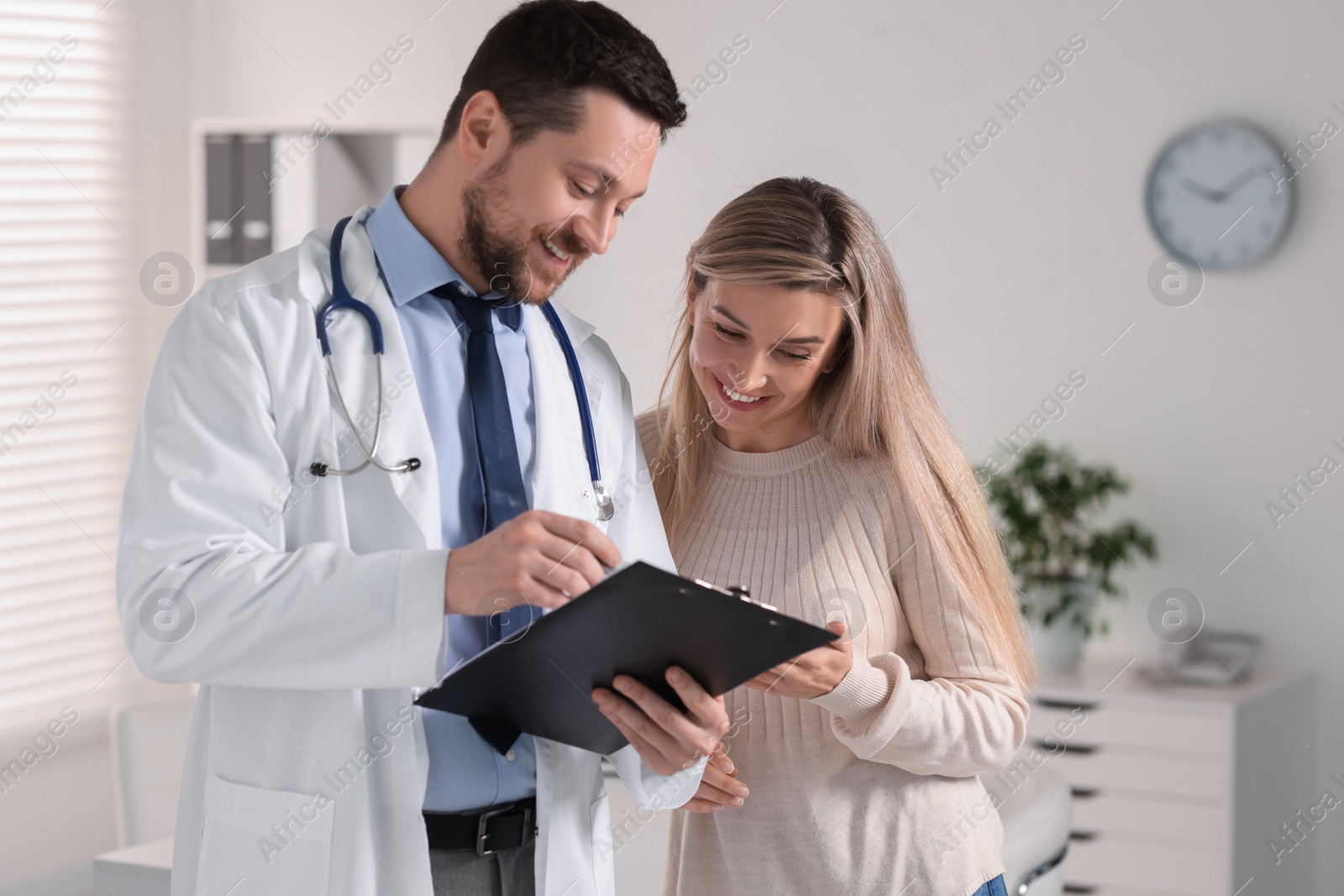 Photo of Professional doctor working with patient in hospital