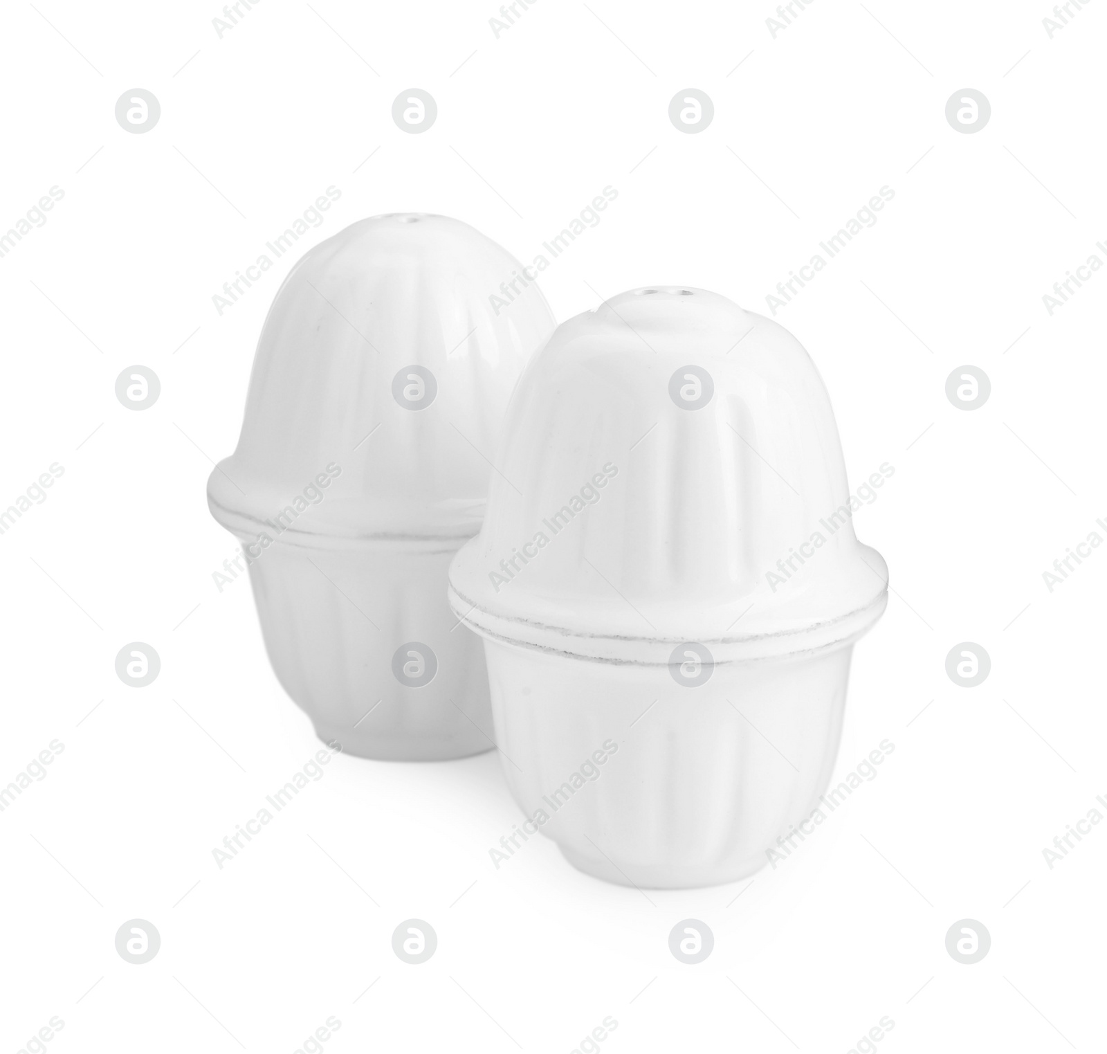 Photo of Salt and pepper shakers isolated on white