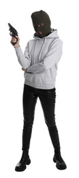Photo of Woman wearing knitted balaclava with gun on white background