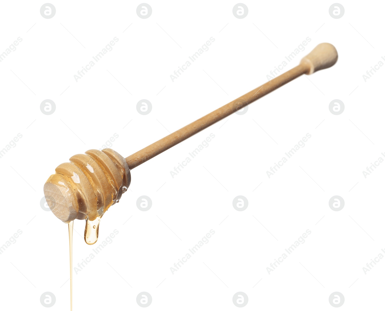 Photo of Natural honey dripping from dipper on white background