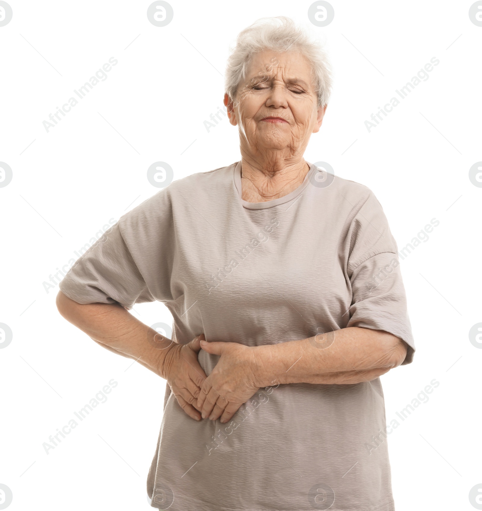 Photo of Elderly woman suffering from ache on white background