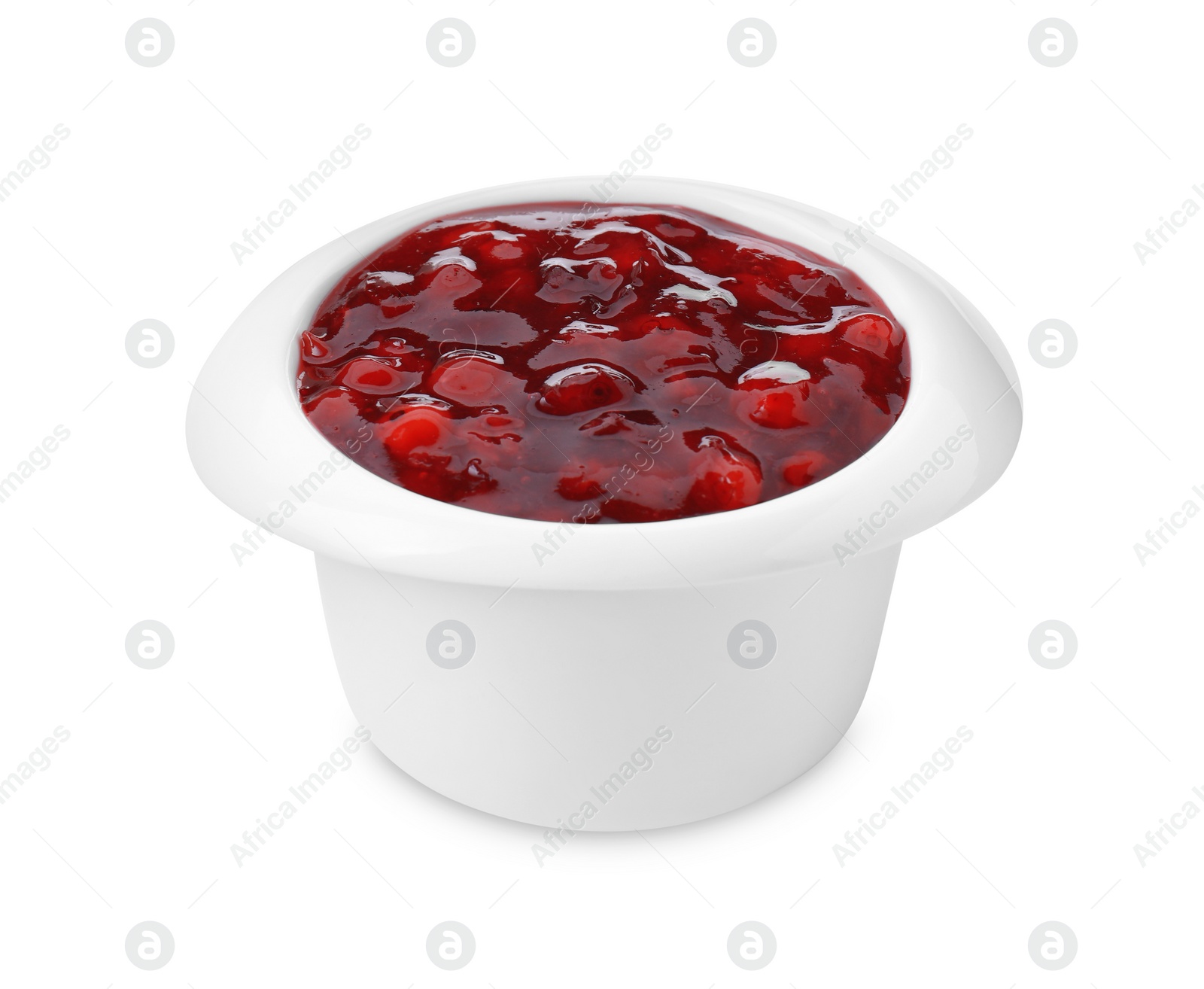 Photo of Fresh cranberry sauce in bowl isolated on white