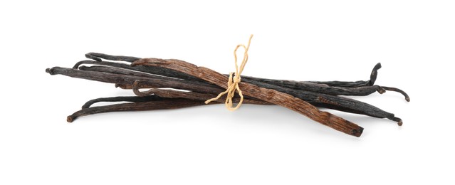 Many aromatic vanilla pods isolated on white