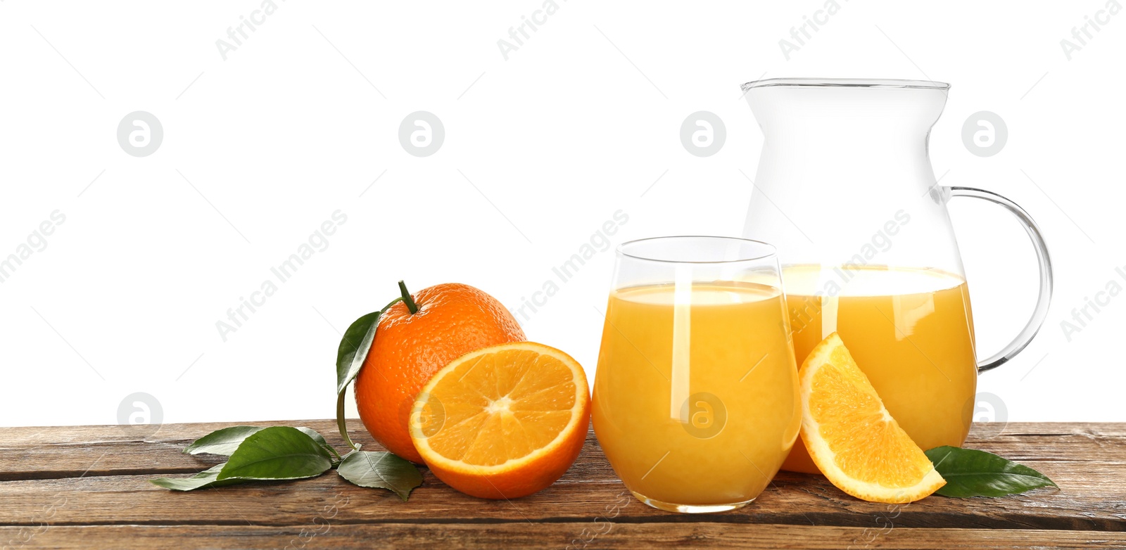 Photo of Delicious orange juice and fresh fruits on wooden table against white background