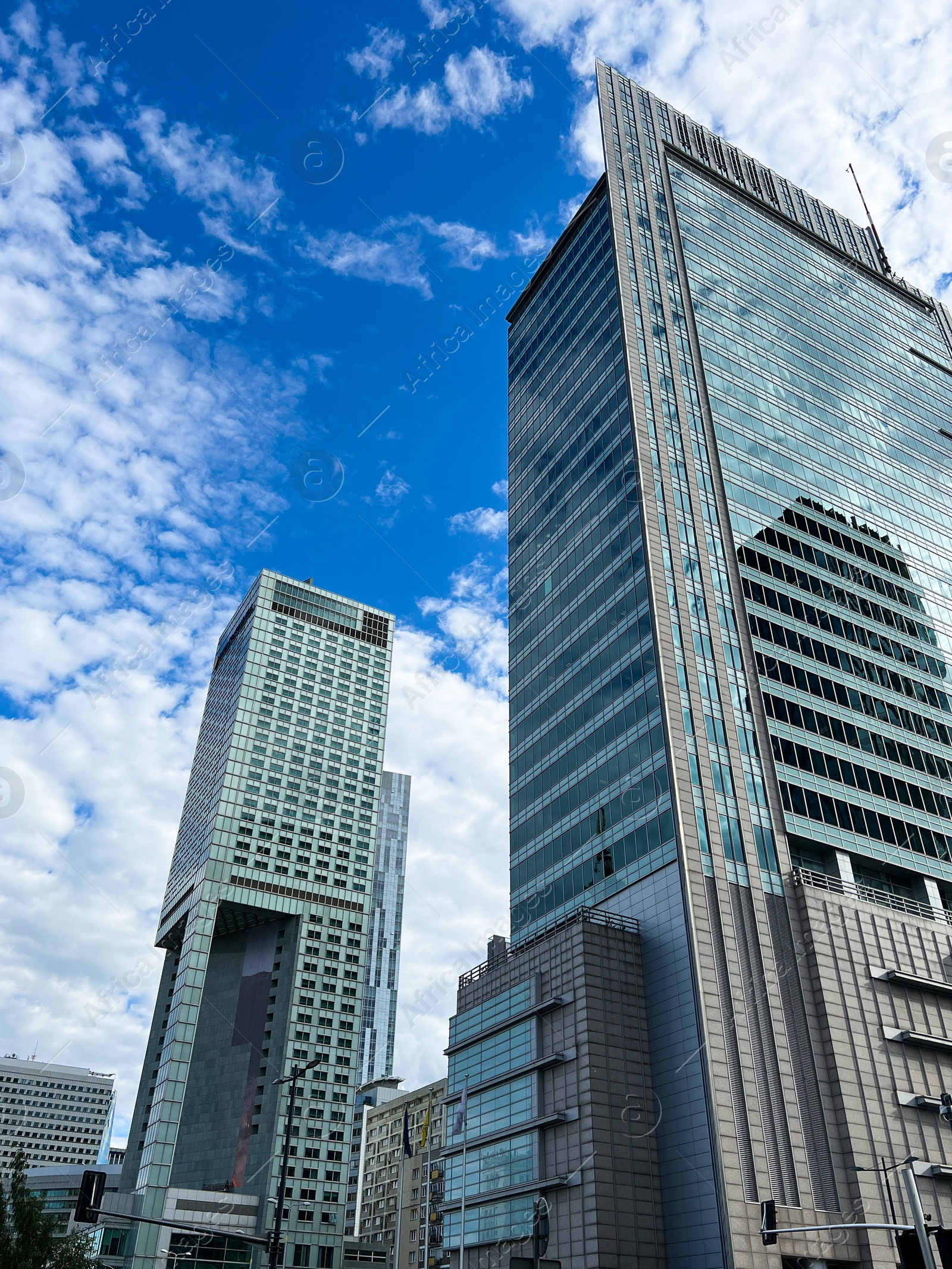 Photo of Beautiful modern buildings on sunny day, low angle view