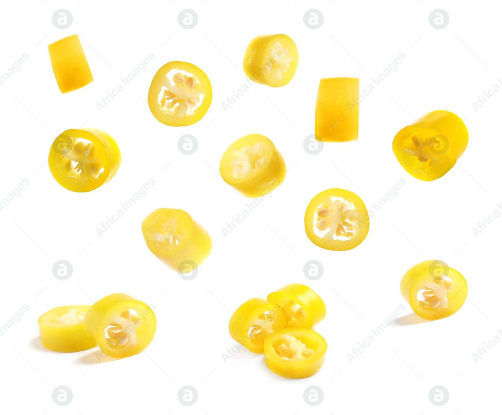 Image of Pieces of yellow chili peppers on white background 