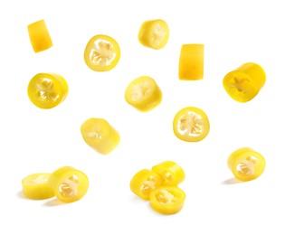 Image of Pieces of yellow chili peppers on white background 