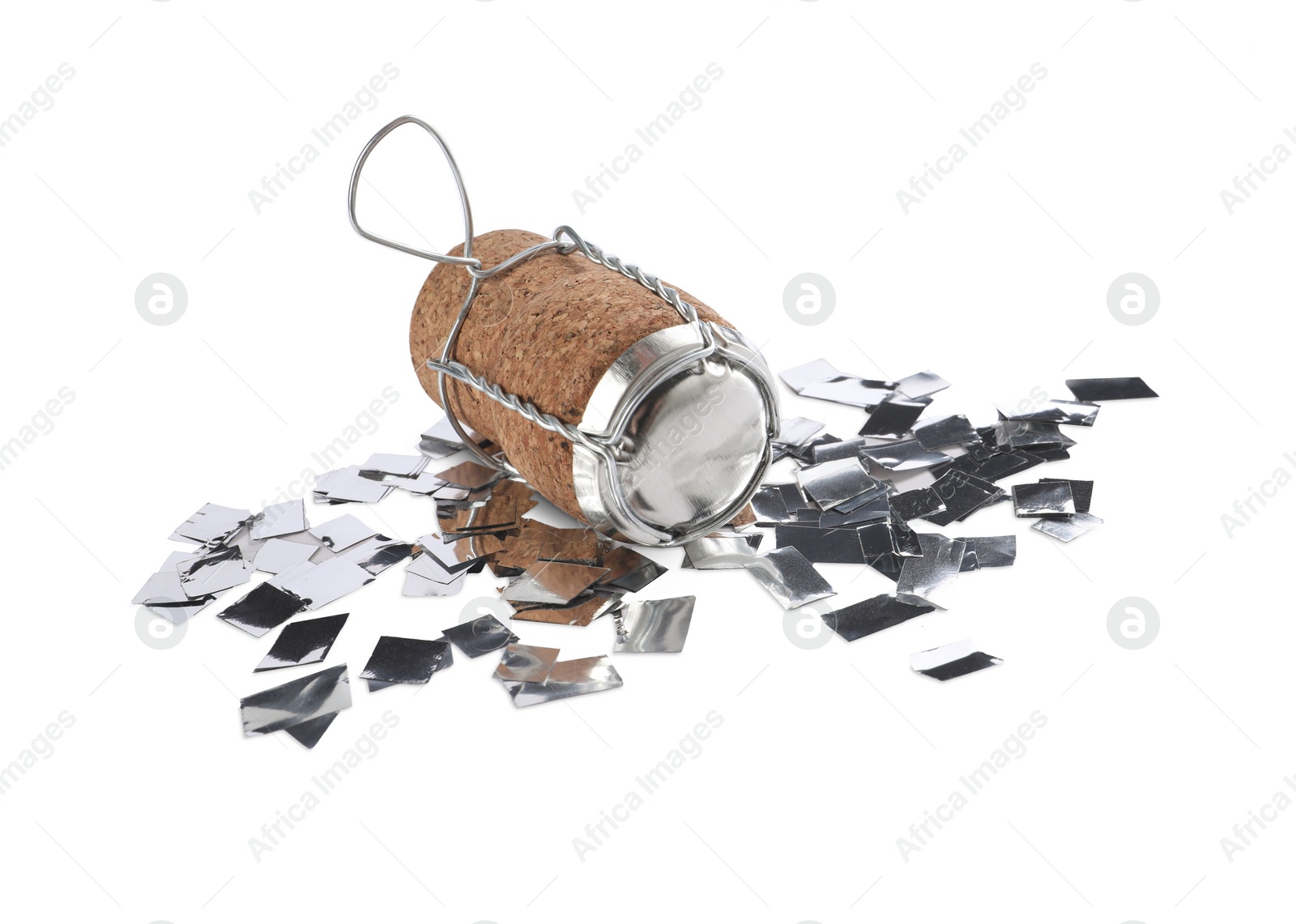 Photo of Cork of sparkling wine with muselet cap and shiny silver confetti on white background