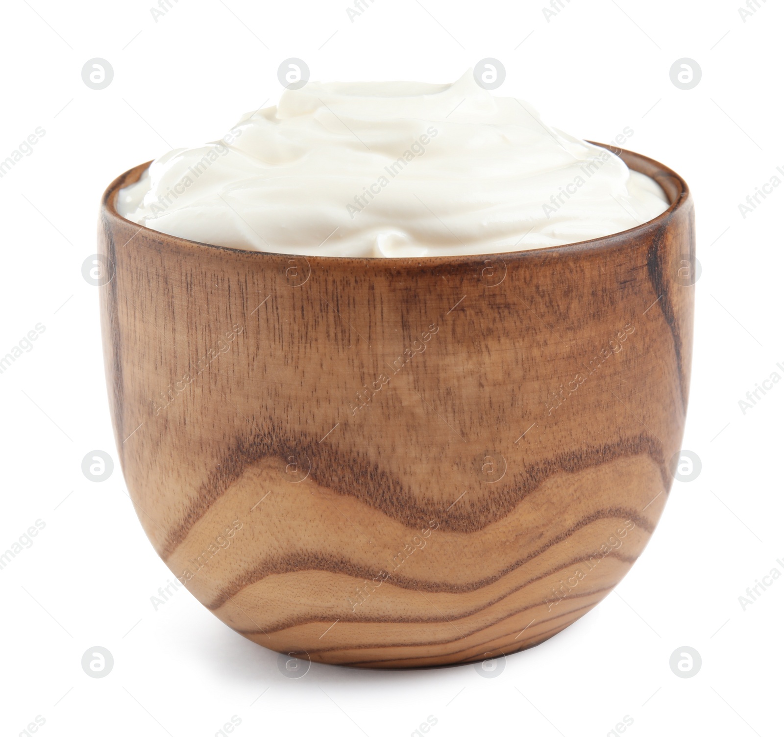 Photo of Wooden bowl with fresh sour cream isolated on white