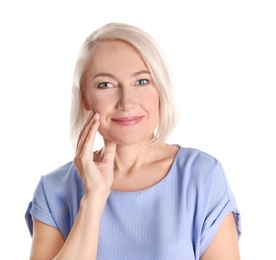 Photo of Portrait of charming mature woman with healthy beautiful face skin and natural makeup on white background