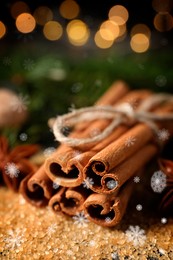 Image of Different spices, closeup. Cinnamon, anise on brown sugar. Bokeh effect