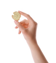 Photo of Woman holding crispy rusk on white background, closeup