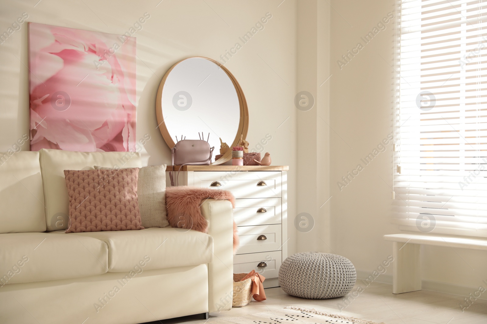 Photo of Trendy round mirror in modern room interior