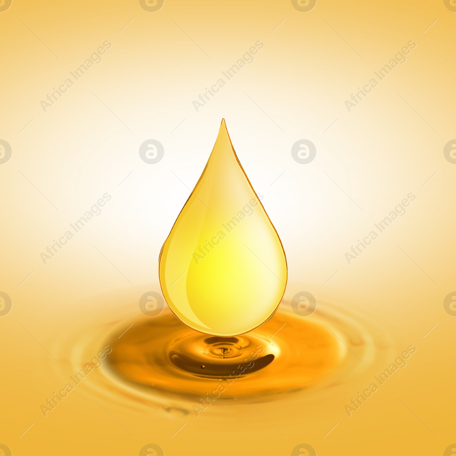 Image of Drop of cooking oil falling into oil on orange gradient background