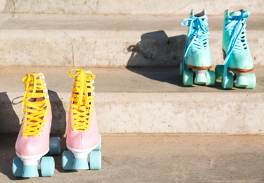 Vintage roller skates on stone stairs outdoors