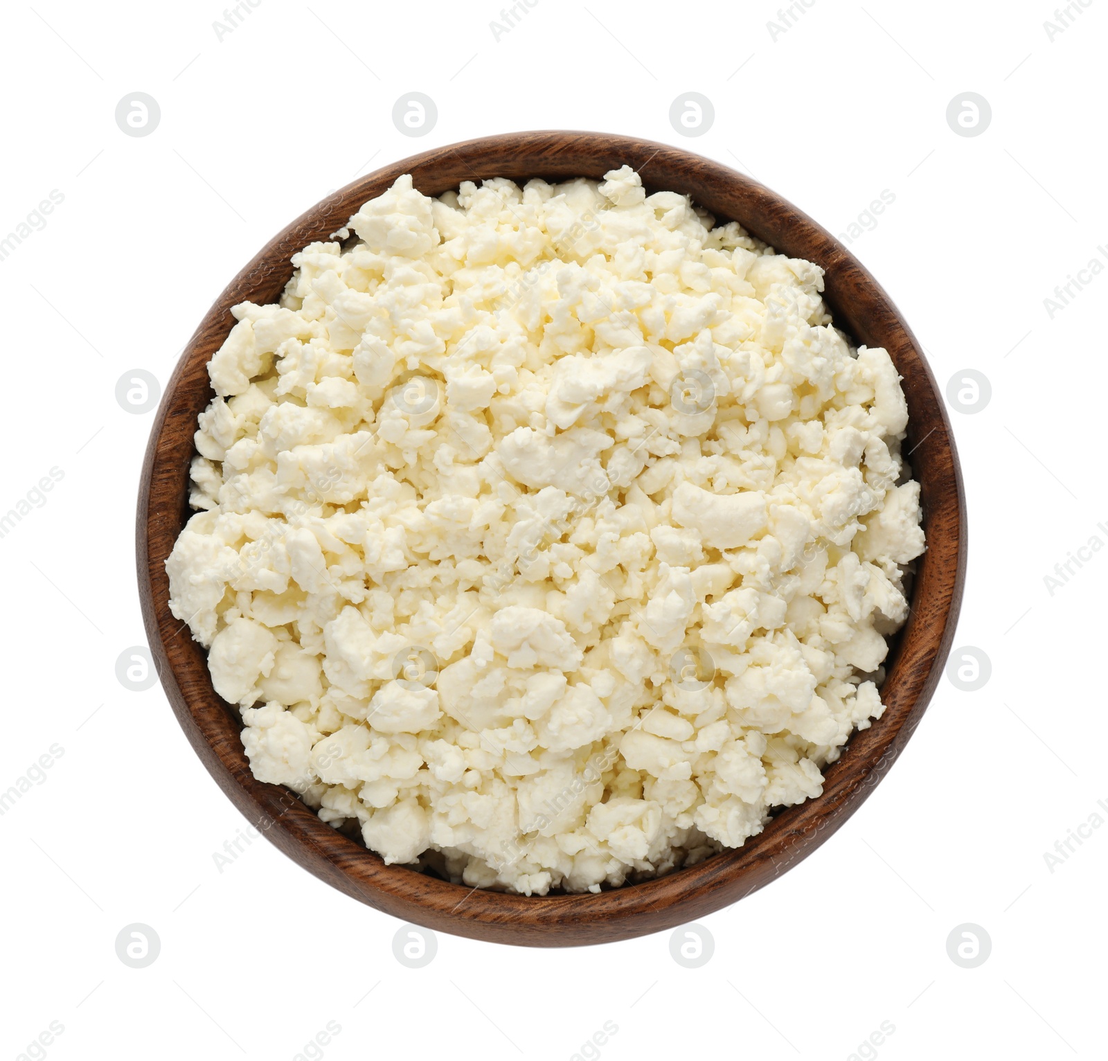 Photo of Delicious fresh cottage cheese in bowl isolated on white, top view