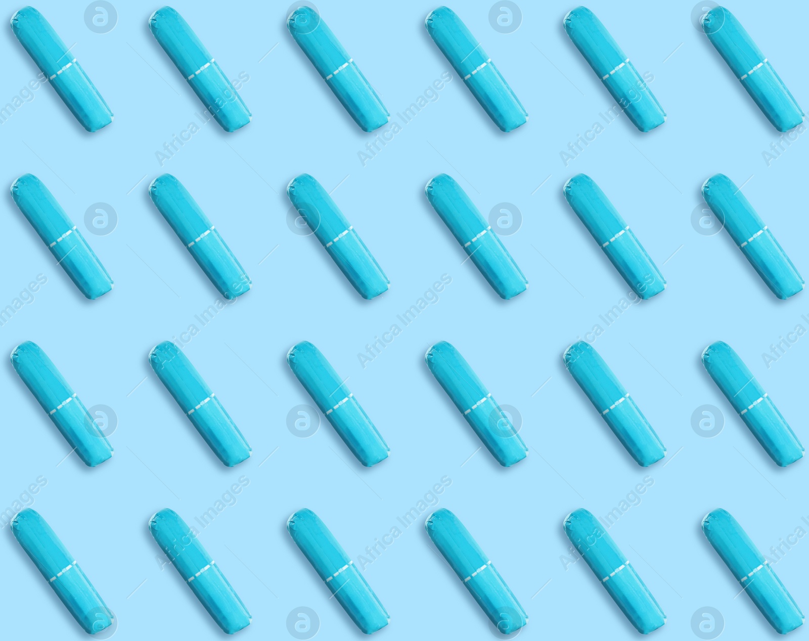 Image of Many tampons on light blue background, flat lay 