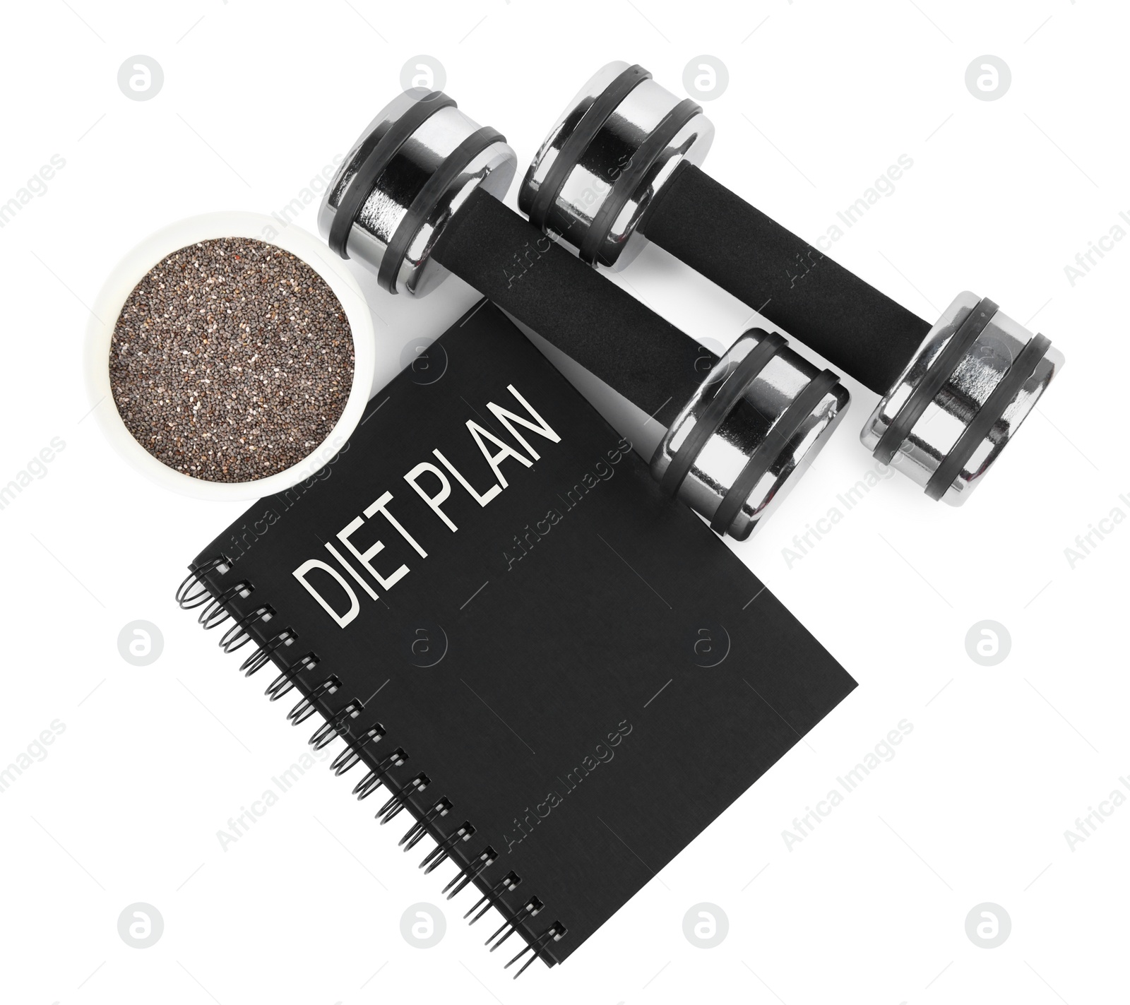 Photo of Dumbbells, notebook with phrase Diet Plan and seeds of chia isolated on white, top view. Weight loss concept