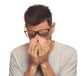 Photo of Man suffering from eyestrain on white background