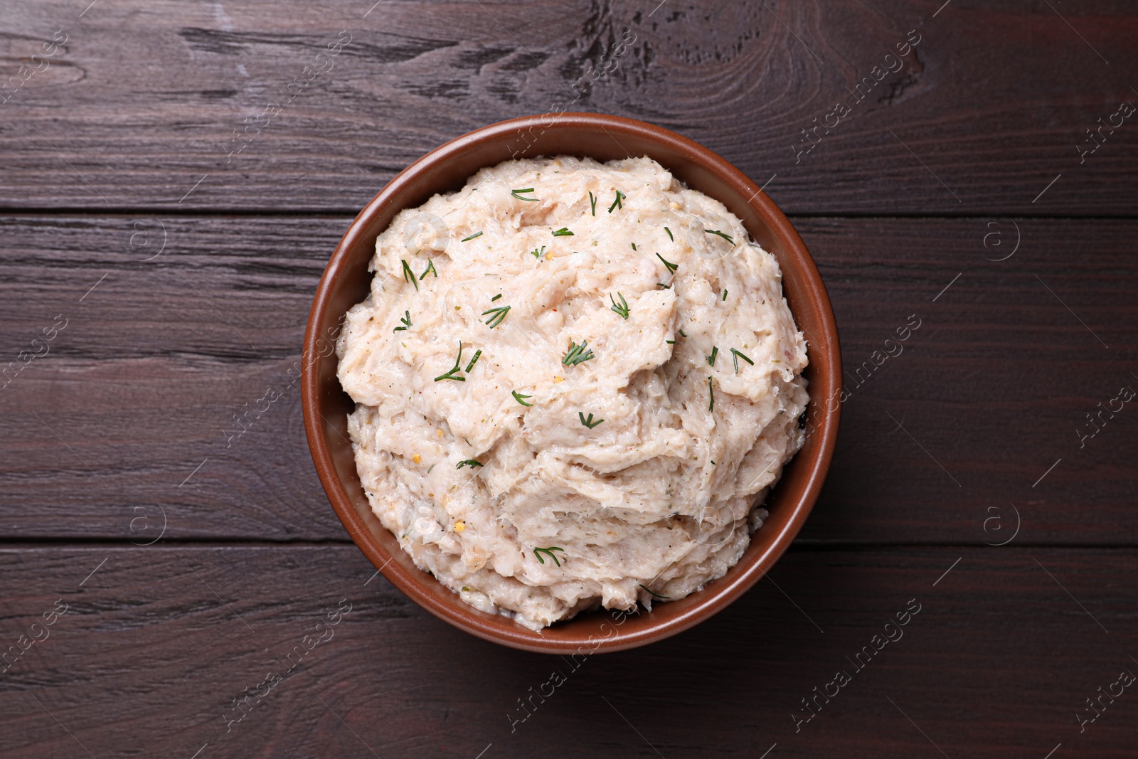 Photo of Delicious lard spread on wooden table, top view