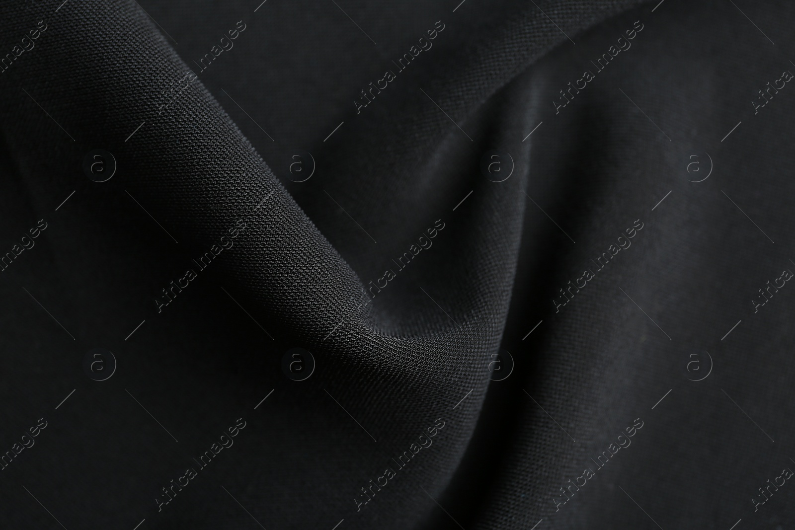 Photo of Texture of beautiful black fabric as background, closeup