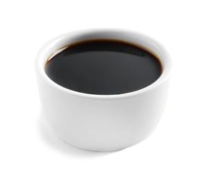 Photo of Traditional soy sauce in bowl on white background