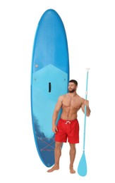Happy man with blue SUP board and paddle on white background