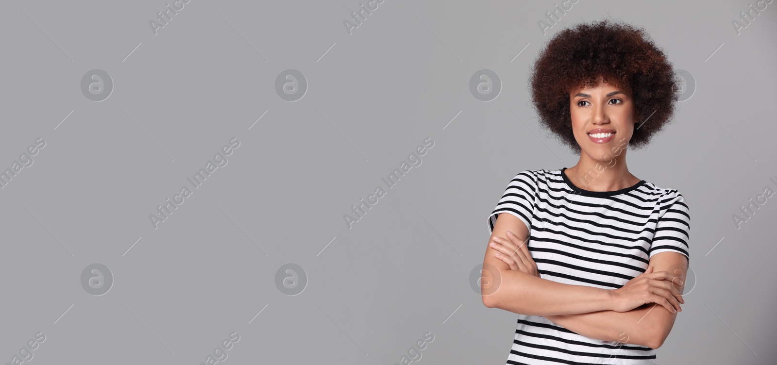 Image of Portrait of beautiful young woman on light grey background. Banner design with space for text