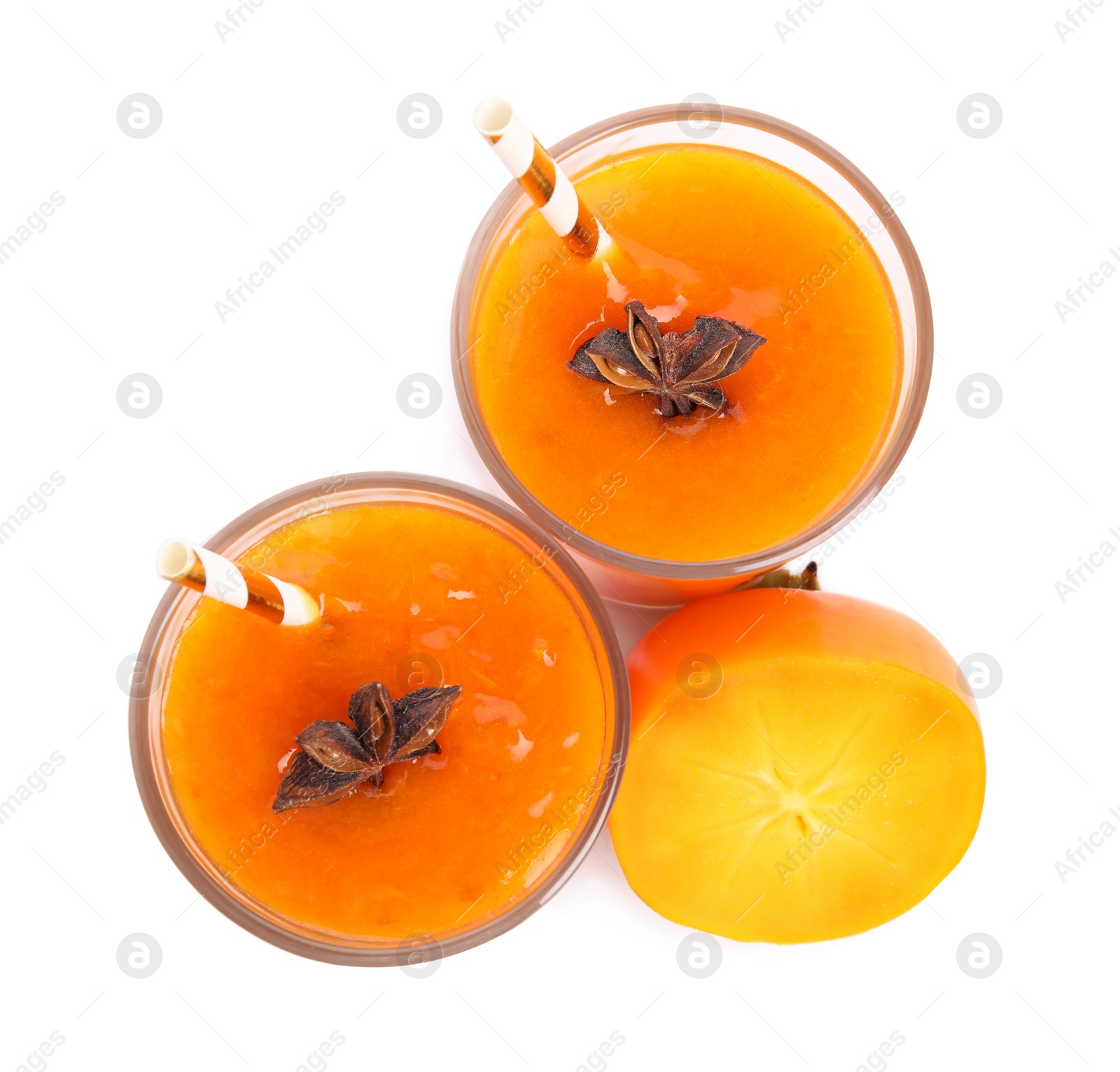 Photo of Tasty persimmon smoothie with anise and fresh fruit isolated on white, top view