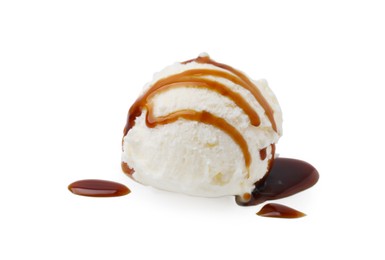 Photo of Scoop of ice cream with caramel sauce isolated on white