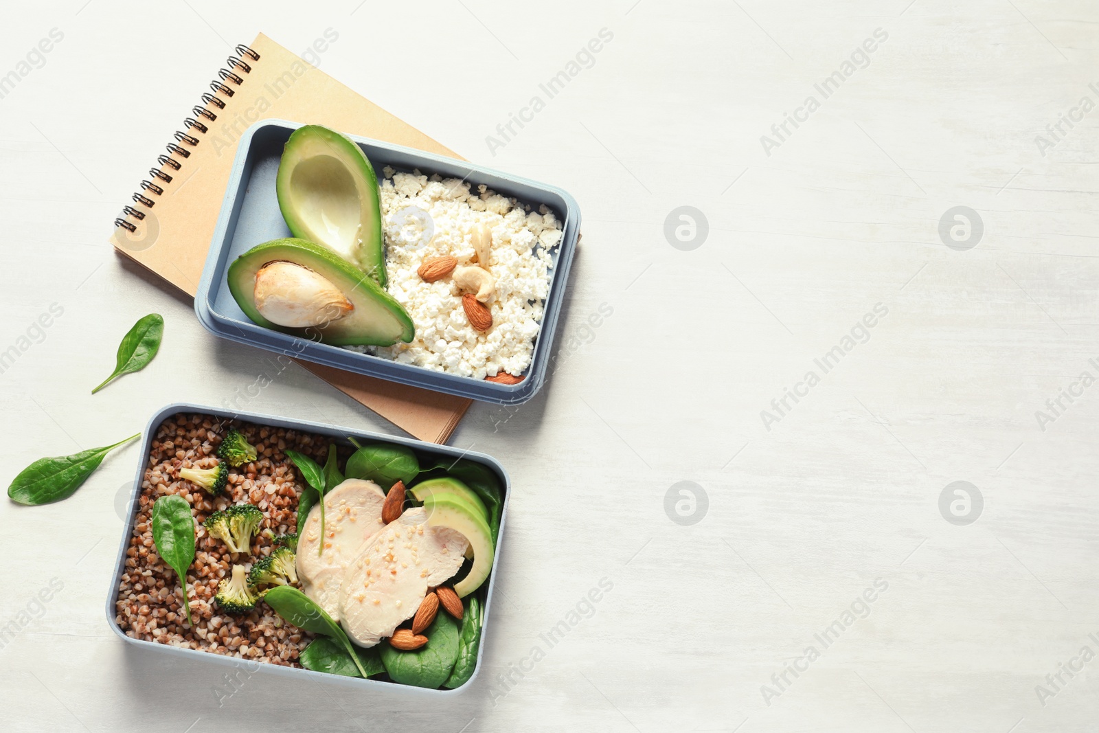 Photo of Flat lay composition with container of natural protein food on light background. Space for text