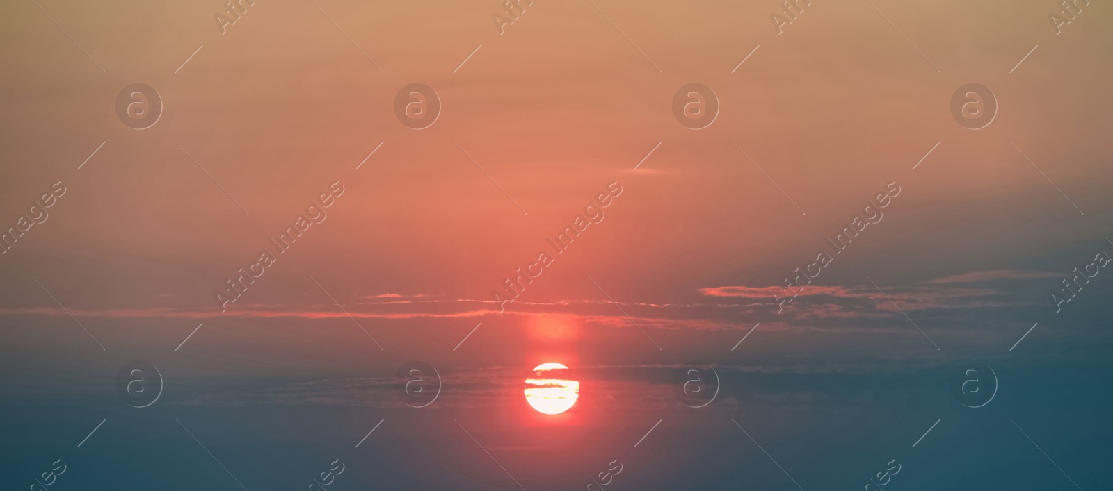 Image of Picturesque sky with sun at sunset. Banner design