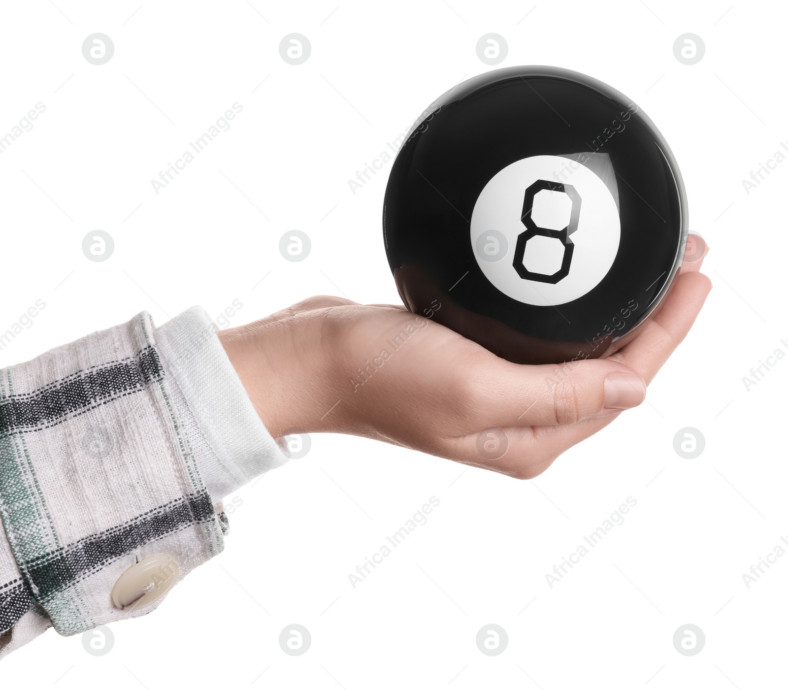 Photo of Woman holding magic eight ball on white background, closeup