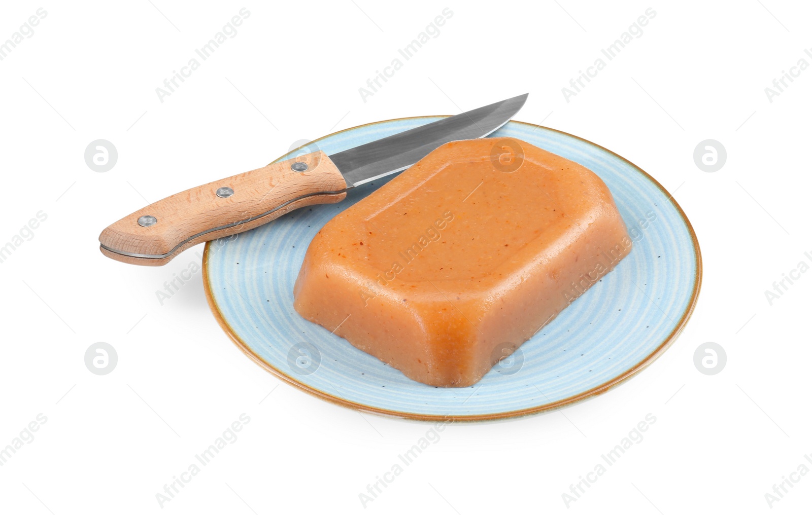 Photo of Delicious sweet quince paste and knife isolated on white