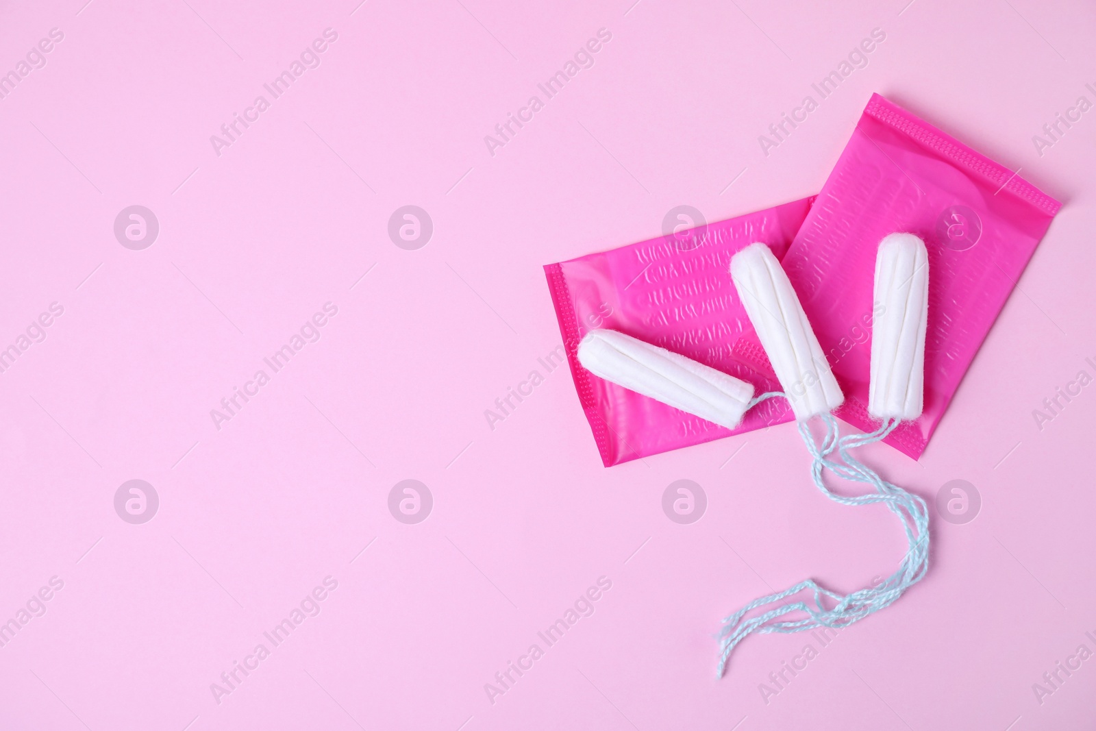 Photo of Different feminine hygiene products on color background, flat lay with space for text. Gynecological care