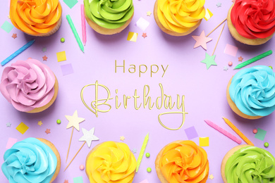 Image of Delicious cupcakes and text Happy Birthday on lilac background, flat lay