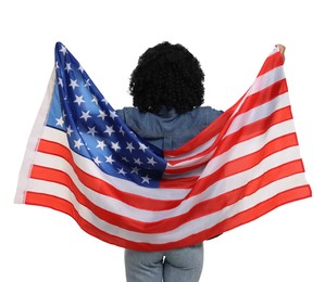 Photo of 4th of July - Independence Day of USA. Woman with American flag on white background, back view