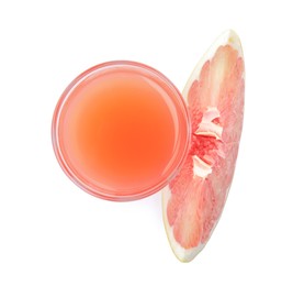 Glass of pink pomelo juice and fruit isolated on white, top view