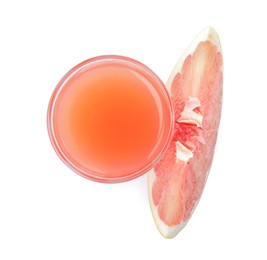 Photo of Glass of pink pomelo juice and fruit isolated on white, top view