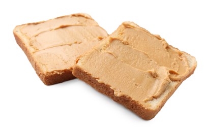 Photo of Tasty peanut butter sandwiches on white background