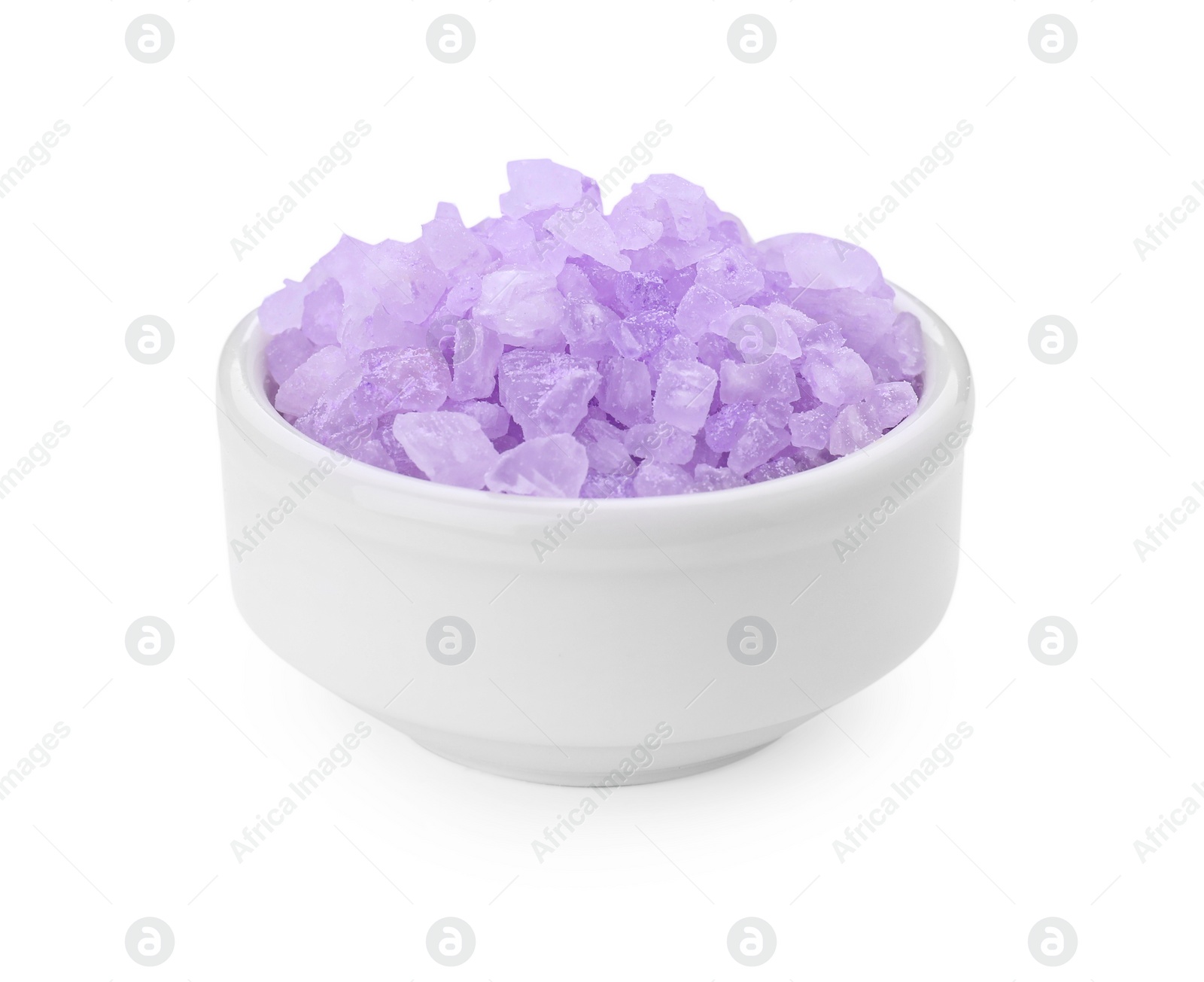 Photo of Bowl with violet sea salt isolated on white