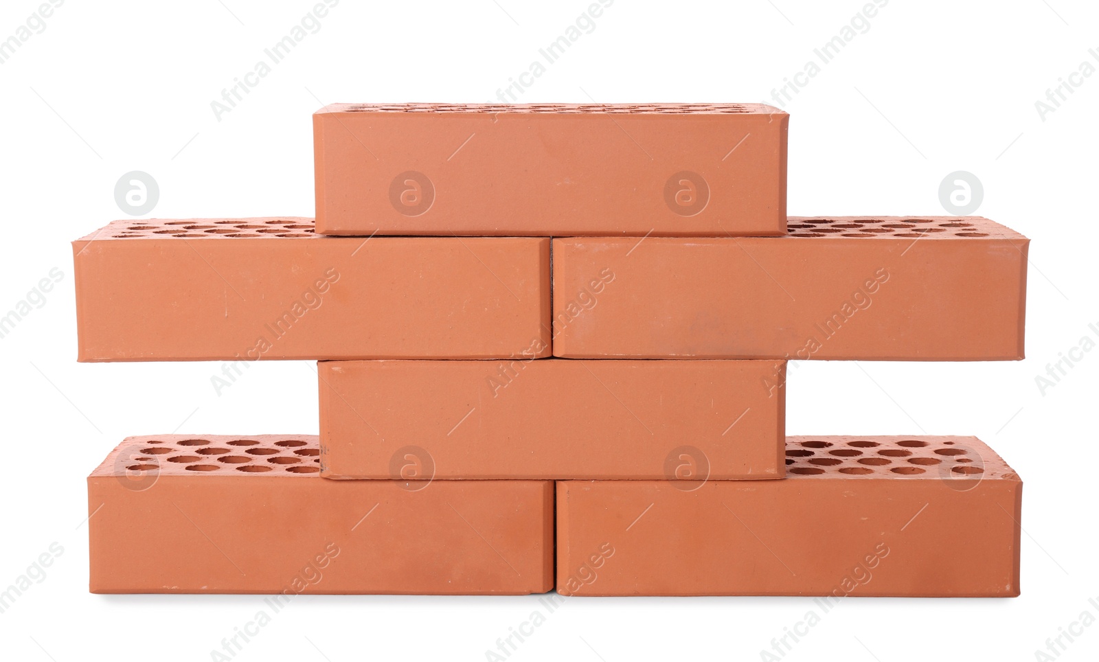 Photo of Many red bricks on white background. Building material