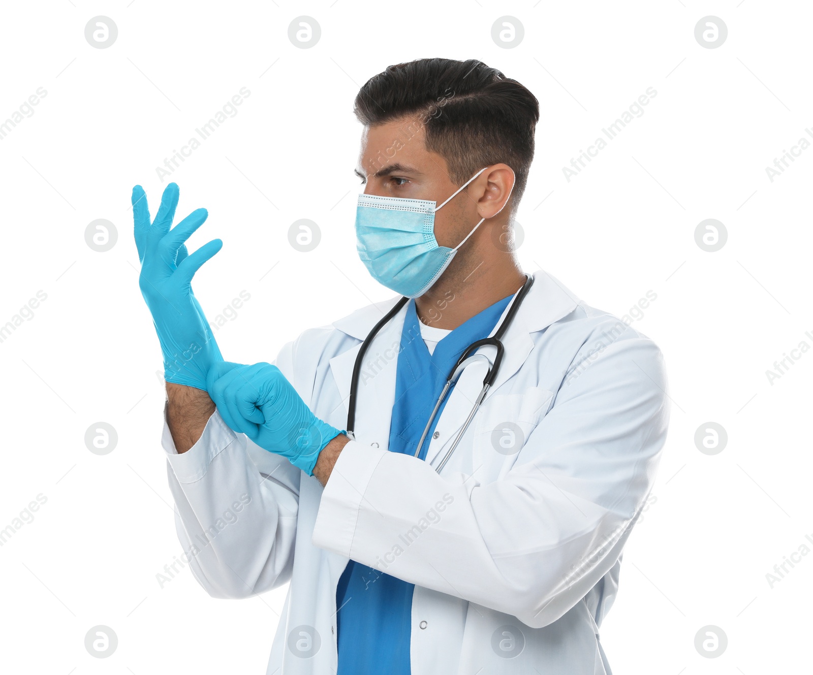 Photo of Doctor in protective mask putting on medical gloves against white background